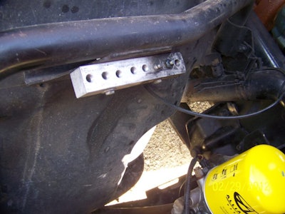 He drilled holes through each block, then thread-tapped them to allow for brass and Zerk fittings.