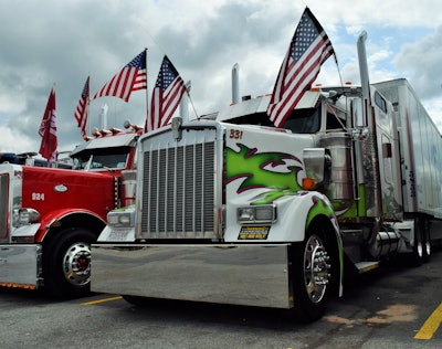 Graphics on the body were designed with colors that also happen to have been Mike and Corren’s wedding-decor-theme hues. Among other adds, the unit’s front bumper is new, following being backed into at a truck stop in the early days of Hussey’s ownership of the rig, as he notes in the video.