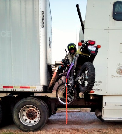 Capell unloading the bike.