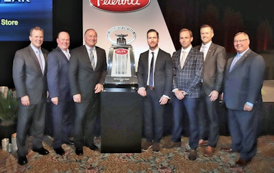 Pictured at the awards ceremony, from left: Leon Handt, Peterbilt Assistant General Manager, Operations; Peyton Harrell, Peterbilt Director of Dealer Development; John Arscott, Greg Arscott, and Jeff Arscott of The Peterbilt Store; Jason Skoog, Peterbilt General Manager; and Robert Woodall, Peterbilt Assistant General Manager, Sales and Marketing.