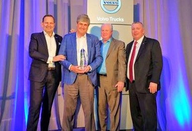 General Truck Sales dealer principal Steve Bassett (left of center) received the award. He’s pictured (left to right) with Peter Voorhoeve, president of Volvo Trucks North America; Bill Hubbartt, regional vice president, central U.S. region; and Bruce Kurtt, senior vice president of U.S. sales.