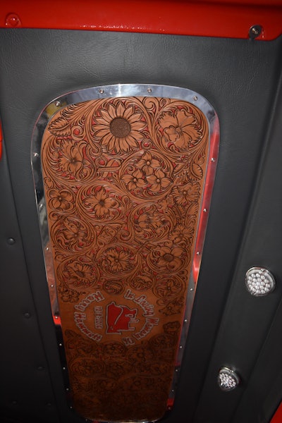 A leather panel in the sleeper features the same “In Loving Memory” decal that is on the back window of the truck honoring Harry Hammett.