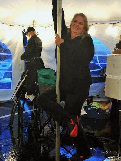 Truckers Holly and Dusty , holding down two of the tent poles. The show must go on.