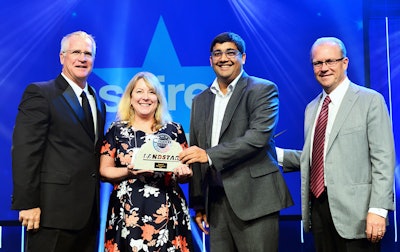 Landstar President and CEO Jim Gattoni (left) with representatives from Google LLC and independent Landstar Agent Brian Putzke (right) of Momentum Transportation.