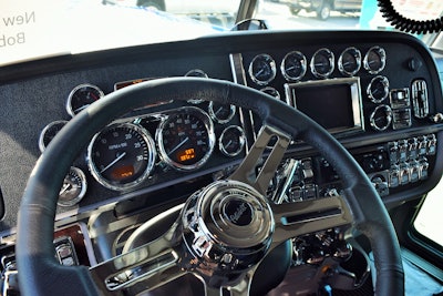 The interior remained mostly stock, Schultz says, but for the aftermarket steering wheel and the installation of a Rockwood chrome-accented dash kit and the shifter knob, as shown in the video.