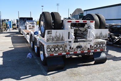 The 55-ton, four-axle trailer features a hydraulic flip. It’s painted to match the power unit.