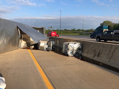 A truck rolled over on I-80/94 near Hammond, Indiana, blocking the three left eastbound lanes. (ISP photos)