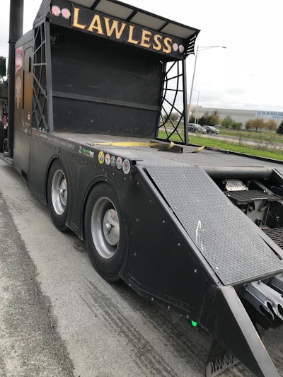 The truck’s name, “Lawless,” comes from the 2012 movie of the same name about a trio of bootlegging brothers in Depression-era Virginia. The hydraulic deck can support a car.