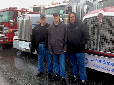 Owner-operator Mark Buckwalter (left) has participated in the annual Mother’s Day Convoy since its second year. This year, he was joined by his owner-operator son, Lamar (right), for the 30th annual Mother’s Day Convoy benefiting the Make-A-Wish Foundation. Joining them was Lamar’s son, Lane (13, center).