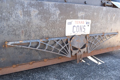The front bumper reflects “The Punisher” skull and spider web theme.