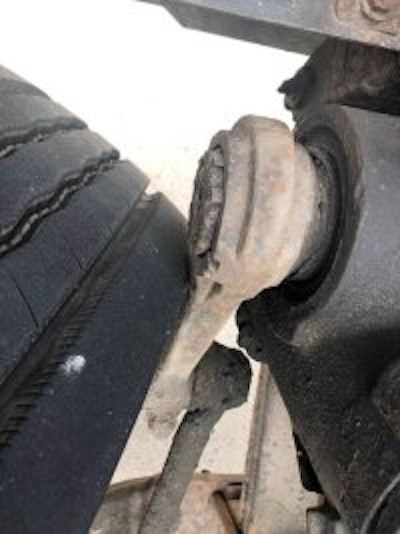 New Hampshire State Police found more than 1,200 violations during International Roadcheck, including this pitman arm making contact with a tire while steering. (NHSP photo)