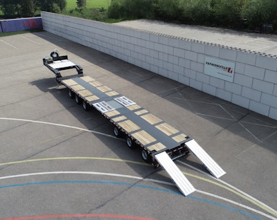 It has a double stretch, allowing flexible spacing between the axle tridems and a total deck length up to 77 feet. The platform over the axle bogies is closed and covered with timber. The trailer can be widened up to 10 feet in these areas, using galvanized pull-out outriggers, the company says. Removable ramps allows for easy loading of mobile machinery. The MultiMax chassis is zinc-plated, ensuring good corrosion protection.