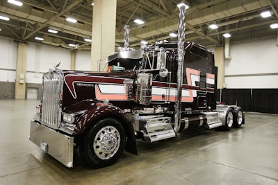 Third place: Mike Hicks drives this 2015 Kenworth W900L, “Black Cherry.” The truck is owned by Kyle Cousins and Fleenor Bros. out of Carthage, Missouri.