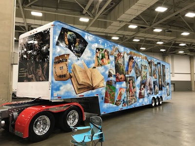 All of the graphics on Hodge’s trailer were airbrushed by hand by Mary Lovell in Calhoun, Georgia. The driver’s side of the trailer features images pertaining to different stories in the Bible, ranging from creation to the resurrection of Jesus. (Photo by Matt Cole)