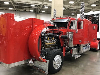 The Rev. James Hodge bought this 1985 Peterbilt 359 EXHD and accompanying 2000 Hallmark trailer to start a mobile ministry. Hodge is the owner of Trucking for the Word of God. (Photo by Matt Cole)