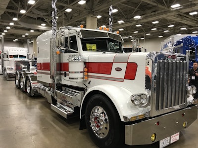 Doug Jameson, driver for J&L Contracting out of Springfield, Missouri, is showing this 2019 Peterbilt 389. J&L bought the truck stock and did nearly a full rebuild to add the company’s flair. (Photo by Matt Cole)