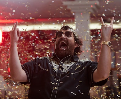 The truck maker is targeting owner-operators specifically with the fuel-efficiency-improvement message through its new “Cash Machine” campaign. Customers meet “Bob,” a fictional owner-operator whose fuel economy is so significantly improved that he’s able to “spend the money saved on his high-end lifestyle,” Volvo notes. Said Fredrik Klevenfeldt, Volvo Trucks North America’s direct of brand and marketing communications: “Fleets and professional drivers in the trucking industry have important and demanding jobs and work hard every day delivering goods and services across North America. I think our customers deserve entertaining industry-related content in order to share a smile once in a while.” No matter where “Bob” stops on his route, he’s given VIP treatment, from gourmet lunches at his favorite truck stop to high-end treatment at the barber shop. He hauls in a gold-plated Volvo VNL. You can view video associated with the campaign via this link.