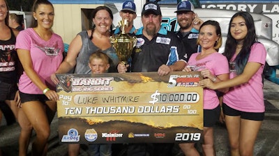 Luke Whitmire (center) earned his first Bandit Big Rig Series win at Five Flags Speedway in Pensacola, Florida.