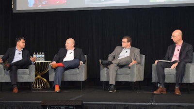 From left: Morgan Brewster of Ike Robotics; Jay Lau of TuSimple; and Paul Schlegel of Starsky Robotics. Mike Camissa (far right) of Camissa Consulting moderated the panel.