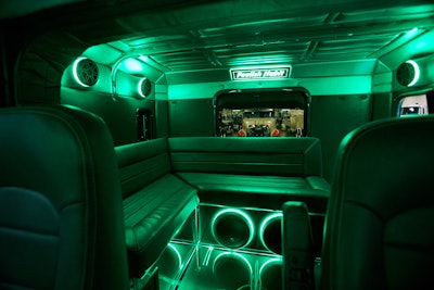 The pulled the bed out of the bunk and added a couch, along with a large sound system.