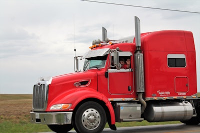 Tony Corns sold his 2008 Peterbilt 386 about a month ago. After completing the poker run by stopping at five local trucking companies, his truck led a convoy that went by his house.