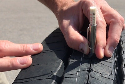 From a CVSA video on the new bulletin, this still shows a tread-depth measurement taken in an evolving tread groove on a new-tech Michelin.