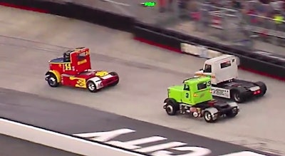 Proffitt (14) was disappointed with how his truck performed in the season finale at Bristol Motor Speedway, but he was still able to hold off Mark Noble (white 74 truck) to win the championship.