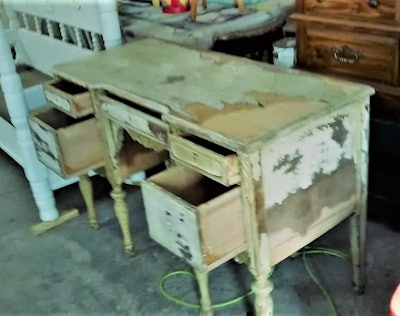 The Barkers found this run-down piece by the side of the road one fine day not so long ago on their way in separate vehicles — Cherie and her in a car, Taylor Barker and another friend in a box truck behind them, on the way toward downtown Kingsport, where Cherie’s Boutique is located (130 Broad St.). As they approached it, Taylor hadn’t noticed it until Cherie hit her brakes and slowed just enough, passing it, that Taylor knew just what he had to do.