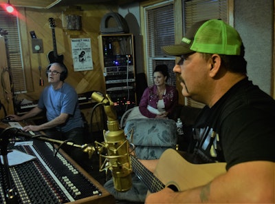 From right: 2019 Trucker Talent Search winner Taylor Barker and his wife, Cherie, with session-wizard Jay Vernali this past Saturday at Vernali’s “Jay’s Place” recording studio on Music Row in Nashville.