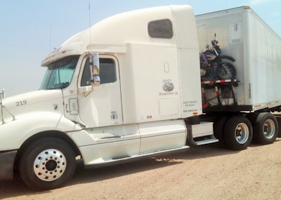 “I believe in being redundant,” said Kenny Capell, referring to his options for electric power sources as well as for ways to get around while away from home. He totes his motorbike on a van-mounted platform. Using a modified crane and winch, he can load and unload the two wheeler quickly.