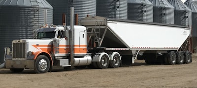 Chad Swan uses this Peterbilt and another, with a two-hopper trailer, to haul produce and fertilizer from his own farm in Canada.