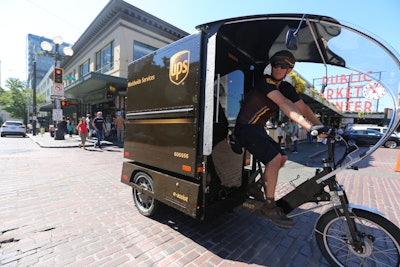 UPS is one of several companies participating in New York City’s pilot program to use cargo bikes instead of delivery trucks to cut down on congestion and emissions in the city. The company introduced cargo bikes in Seattle last year. (UPS photo)