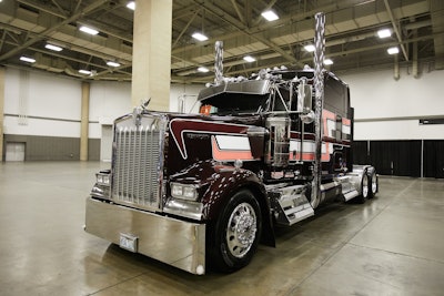 Mike Hicks drives this 2015 Kenworth W900L Icon, “Black Cherry,” for Carthage, Missouri-based Fleenor Brothers. (Photos by Jason Kindig)