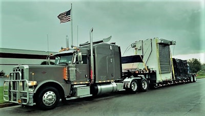 The Peterbilt Carlson hauls platform freight in for Regal Services out of Ripley, a mostly dry van and reefer fleet.