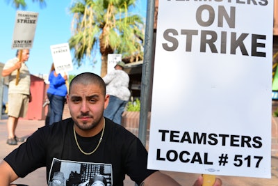The Teamsters union is a major proponent of stricter regulation of worker classification. Teamsters Local 517 represents milk haulers and bus drivers, as well as many non-driving professionals. This photo was taken in 2014 during a strike against the Golden Empire Transit District in Bakersfield, California.
