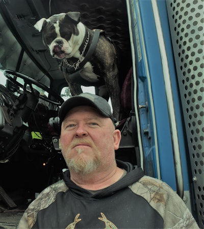 Terra Trucking-leased owner-operator Rob Goodwin and Patty, his three-year-old American bulldog, lookout, guard and so much more