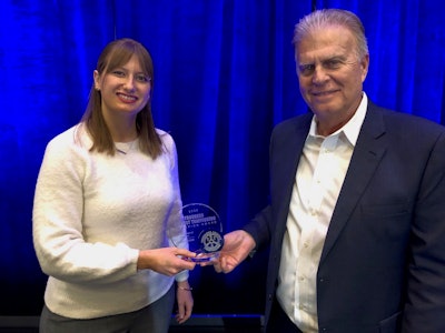 Helen Van Dam, director of TAT’s Freedom Drivers Project presented the TAT Champion Award to TravelCenters of America President and COO Barry Richards.