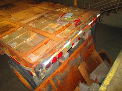 Border Patrol agents found more than 1,500 pounds of marijuana under the flooring of a flatbed trailer near El Paso, Texas. (CBP photo)