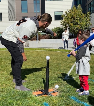 Liam getting a little batting and base-running instruction from reliever Shaun Anderson.