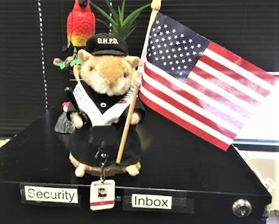 Load board security staffs take broker fraud seriously — but also with a little levity in the case of Truckstop.com and this toy chipmunk in a police outfit, says the company’s Willie Taylor. “Some bad guys do get caught. We’ll see them get captured, and my team has a little party every time we see one of those.” Chippy, as they’ve dubbed this little guy, gets passed to the Security Specialist of the Month. “He sings ‘Bad Boys,’ and he dances. They get a plaque and recognition for a Chippy Award.”