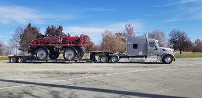 Semi truck hauling heavy duty equipment