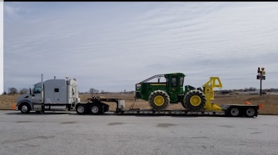 Kevin Kocmich hauls over-dimensional freight, such as this logging tractor.