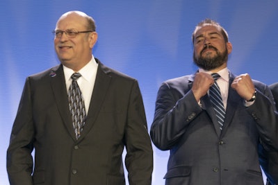 Diamond Transportation President Jon Coco, right, reacts upon the announcement that Kevin Kocmich (left) was named 2019 Owner-Operator of the Year.