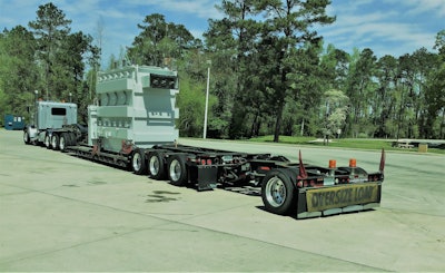 Savannah, Ga.-based owner-operator Bruce Arnold hauls this 1997 Load King three-plus-one RGN with a lift-axle-outfitted 2018 Peterbilt 367.