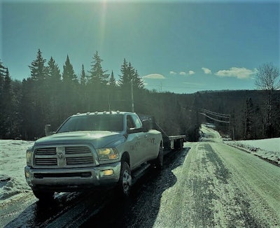 The S2 Transport three-truck fleet’s drivers are all company employees and pull in 2018 Ram 3500 trucks outfitted with fifth wheels like this one, pictured this past winter in Vermont.