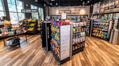An example interior shows a variety of offerings and the look and feel of the brand’s locations. Not shown, but which Riggs emphasizes, are the quality and cleanliness of the restrooms: “We don’t have shower amenities, but have high-end [and private, one-stall] restrooms.”