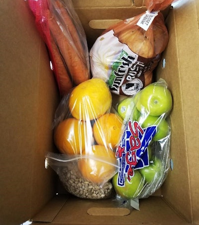 Fruits and vegetables in a cardboard box