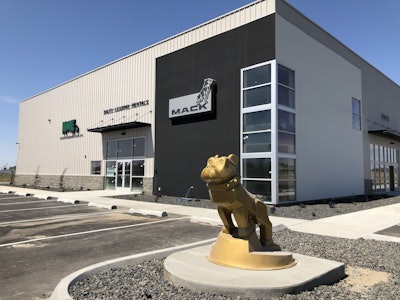 New Mack dealer group opens Burbank, Washington, location | Northwest Equipment Sales expanded its dealer footprint with the fourth location, Tri-Cities, based in Burbank, Washington. The new facility will serve one of the fastest growing areas of Washington State. Located off U.S. 12, the 30,000-square-foot facility rests on 10 acres at 171 Gateway Road, Burbank. The Tri-Cities facility offers $250,000 worth in parts inventory, with plans to increase that amount in the next few months. The facility has four drive-through service bays and an end bay, allowing 15 trucks to be serviced at one time. it employs eight service technicians and plans to have 18 total employees total by the end of the year. The Tri-Cities location joins Northwest Equipment Sales sites in Twin Falls and Boise, Idaho, and Hermiston, Oregon. Jim Hibler, founder of the dealer group, first opened a used truck facility in 1981 in Twin Falls. In 1988, he purchased a Mack franchise and expanded to Boise in 1995, followed by Hermiston in 2007. Opening the new site had its challenges, Hibler said. Ground was broken on March 1, 2019, but work was stopped March 23, 2020, due to Gov. Jay Inslee’s “Stay Home, Stay Healthy” order. However, as part of the transportation industry, the new facility was considered essential, and construction resumed at their new location on March 31. “It was definitely a challenge, but we’re pleased that we were ultimately able to move forward and open this new dealership for our customers.” Hours for the facility will be 7:30 a.m.-5:30 p.m. Monday through Friday.