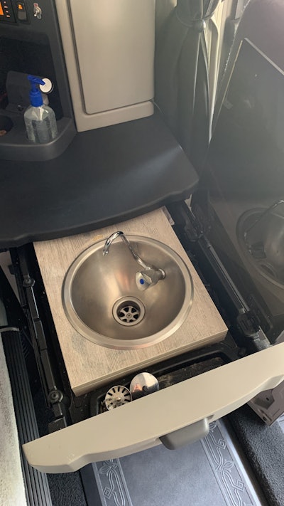 Sheehan built this custom pull-out sink for his truck from yacht parts.