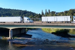 Trucks-on-bridge-over-hood-river-oregon-2020-06-03-12-11